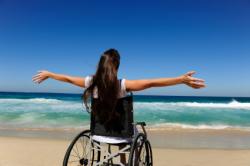 stock_happy-disabled-woman-on-beach