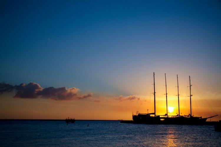 Sunset sailboat silhouette Aruba