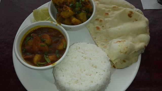 Shrimp Curry, Peanut Aloo with rice and naan.jpg