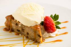 Elements serves local dessert specialty Pan Bolo - bread pudding-cake with raisins, chopped prunes and nuts. Served with vanilla